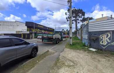 Imagem: A casa possui 2 Dormitórios, 5 Banheiros, 2 Vagas na garagem