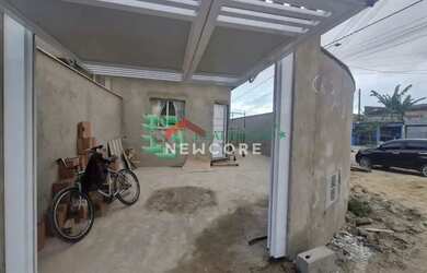 Imagem: A casa possui 2 Dormitórios, 2 Banheiros, 2 Vagas na garagem