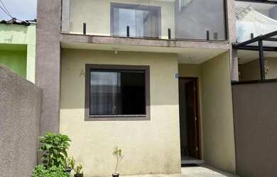 Imagem: A casa à venda possui 3 Dormitórios, 1 Banheiro, 2 Vagas na