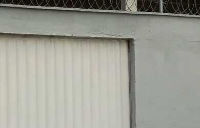 Imagem: A casa possui 3 Dormitórios, 2 Banheiros, 3 Vagas na garagem