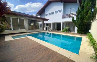 Imagem: A casa para alugar possui 4 Dormitórios, 5 Banheiros, 4 Vagas