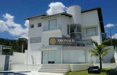 Imagem: A casa em condomínio possui 4 Dormitórios, 5 Banheiros, 5