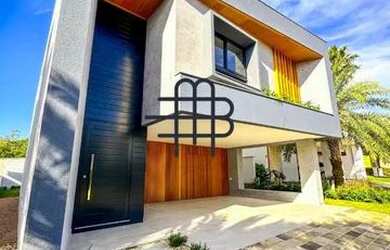 Imagem: A casa em condomínio possui 4 Dormitórios, 5 Banheiros, 4