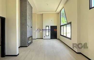 Imagem 6: Casa em Porto Alegre, no bairro Hípica, com 3 dormitório s , e 3 banheiros,...