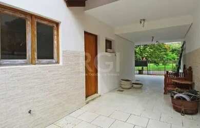 Imagem 5: Casa em Porto Alegre, no bairro Hípica, com 3 dormitório s , e 3 banheiros,...
