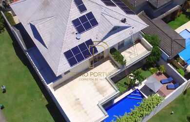 Imagem: A casa em condomínio possui 4 Dormitórios, 5 Banheiros, 3