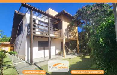 Imagem: A casa possui 3 Dormitórios, 3 Banheiros, 3 Vagas na garagem