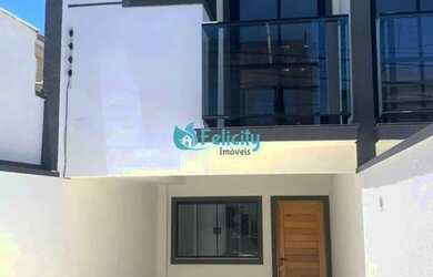 Imagem: A casa possui 3 Dormitórios, 3 Banheiros, 2 Vagas na garagem