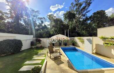 Imagem: A casa possui 2 Dormitórios, 2 Banheiros, 3 Vagas na garagem