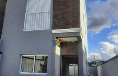 Imagem: A casa possui 3 Dormitórios, 2 Banheiros, 2 Vagas na garagem