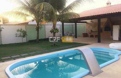 Imagem: A casa possui 4 Dormitórios, 2 Banheiros, 2 Vagas na garagem