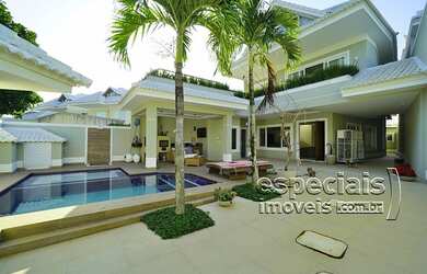 Imagem: A casa em condomínio possui 5 Dormitórios, 5 Banheiros, 2