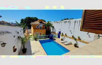 Imagem: A casa em condomínio possui 5 Dormitórios, 5 Banheiros, 5