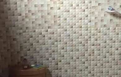 Imagem: A casa possui 4 Dormitórios, 2 Vagas na garagem e está localizado