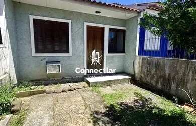 Imagem: A casa possui 2 Dormitórios, 1 Banheiro, 1 Vaga na garagem