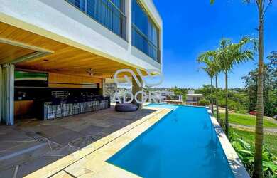 Imagem: A casa em condomínio possui 5 Dormitórios, 5 Banheiros, 4