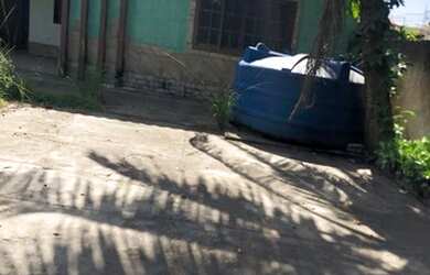 Imagem: A casa possui 3 Dormitórios, 2 Banheiros, 5 Vagas na garagem