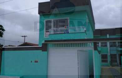 Imagem: A casa possui 2 Dormitórios, 3 Banheiros, 1 Vaga na garagem