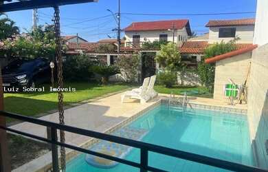 Imagem: A casa possui 4 Dormitórios, 3 Banheiros, 3 Vagas na garagem