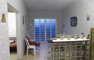 Imagem: A casae possui 4 Dormitórios, 3 Vagas na garagem está localizado