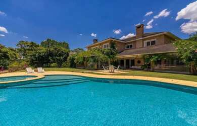 Imagem: A casa em condomínio possui 5 Dormitórios, 5 Banheiros, 1