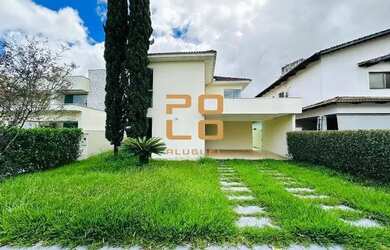 Imagem: A casa possui 4 Dormitórios, 5 Banheiros, 4 Vagas na garagem