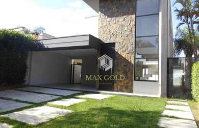 Imagem: A casa possui 3 Dormitórios, 3 Banheiros, 2 Vagas na garagem