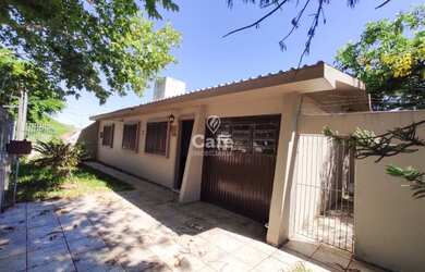 Imagem: A casa possui 3 Dormitórios, 3 Banheiros, 1 Vaga na garagem