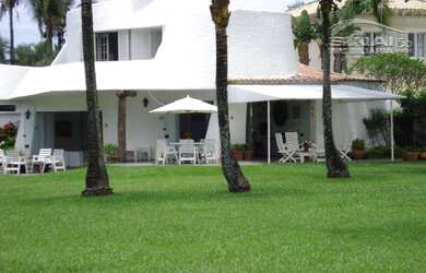 Imagem: A casa possui 5 Dormitórios, 5 Banheiros, 436m² de Área e