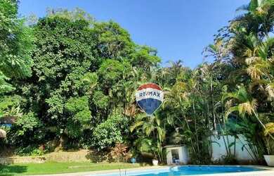 Imagem: A casa em condomínio possui 4 Dormitórios, 5 Banheiros, 4