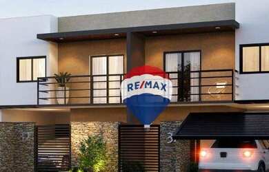 Imagem: A casa possui 3 Dormitórios, 3 Banheiros, 2 Vagas na garagem