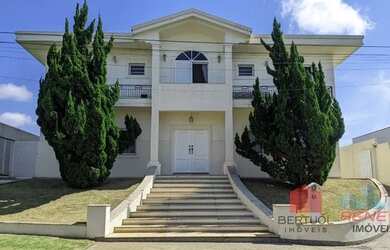 Imagem: A casa à venda possui 5 Dormitórios, 5 Banheiros, 4 Vagas