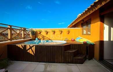 Imagem: A casa em condomínio possui 3 Dormitórios, 4 Banheiros, 2