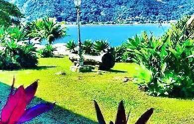 Imagem: A casa possui 5 Dormitórios, 5 Banheiros, 5 Vagas na garagem