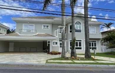 Imagem: A casa em condomínio possui 5 Dormitórios, 5 Banheiros, 3