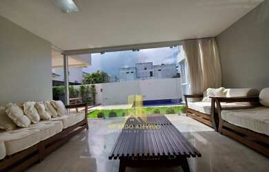 Imagem: A casa possui 4 Dormitórios, 5 Banheiros, 4 Vagas na garagem