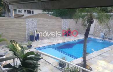 Imagem: A casa em condomínio à venda possui 4 Dormitórios, 5 Banheiros