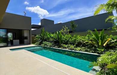 Imagem: A casa em condomínio possui 4 Dormitórios, 5 Banheiros, 4