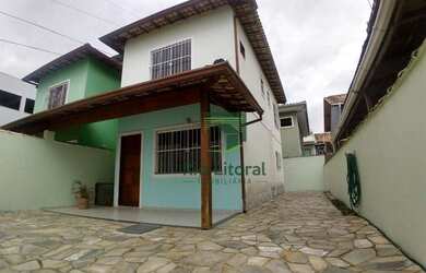 Imagem: A casa possui 2 Dormitórios, 3 Banheiros, 2 Vagas na garagem