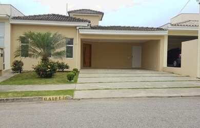 Imagem: A casa possui 3 Dormitórios, 5 Banheiros, 4 Vagas na garagem