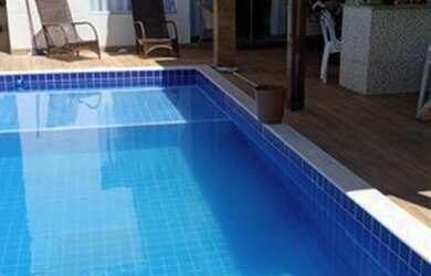 Imagem: A casa em condomínio possui 5 Dormitórios, 5 Banheiros e