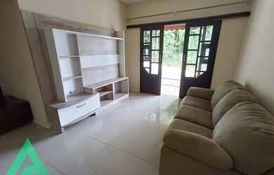 Imagem: A casa possui 2 Dormitórios, 3 Banheiros, 2 Vagas na garagem