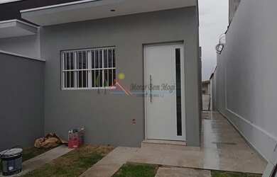 Imagem: A casa possui 3 Dormitórios, 2 Banheiros, 2 Vagas na garagem