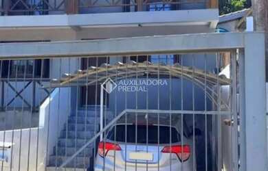 Imagem: A casa em condomínio possui 2 Dormitórios, 2 Banheiros e 156m²