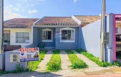 Imagem: A casa possui 2 Dormitórios, 1 Banheiro, 2 Vagas na garagem