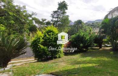 Imagem: A casa possui 3 Dormitórios, 3 Banheiros, 4 Vagas na garagem