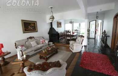 Imagem: A casa possui 3 Dormitórios, 5 Banheiros, 5 Vagas na garagem