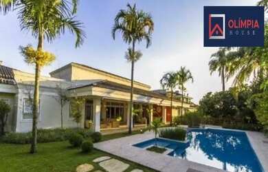 Imagem: A casa possui 5 Dormitórios, 5 Banheiros, 5 Vagas na garagem