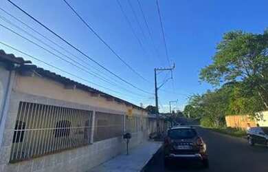 Imagem: A casa possui 3 Dormitórios, 2 Banheiros, 4 Vagas na garagem