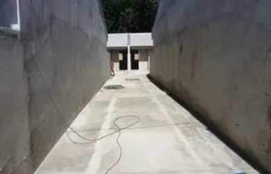 Imagem: A casa possui 2 Dormitórios, 1 Banheiro, 1 Vaga na garagem